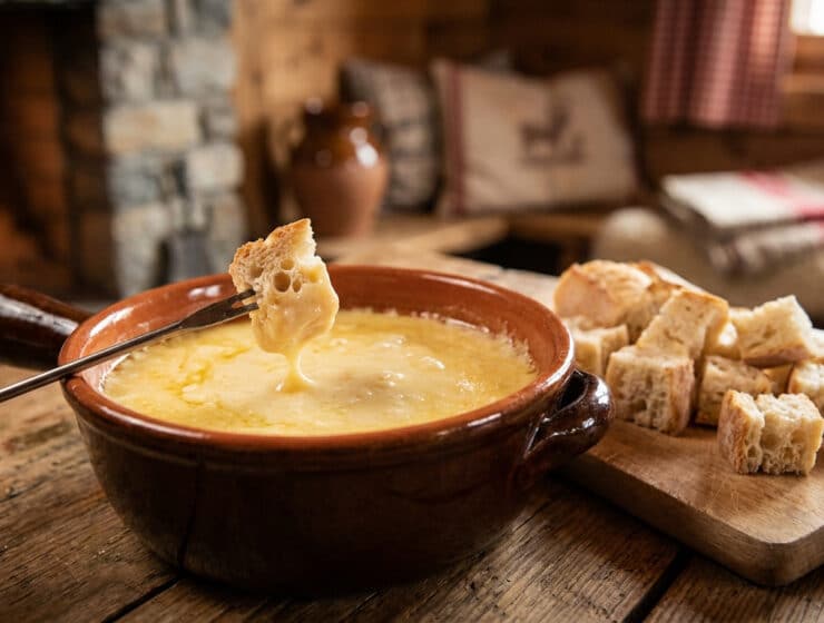traditional fondue savoyarde with rustic bread